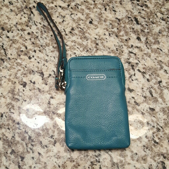 Barely used green Coach wristlet