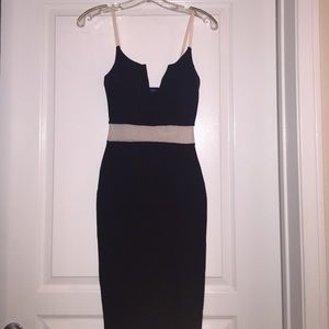 Gorgeous Cocktail dress with mesh accent.