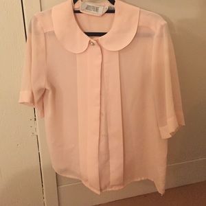 Perfectly proper sheer pink blouse