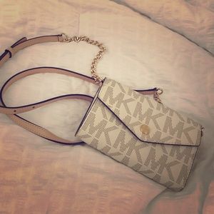 Small MK cross body;used twice. Perfect condition!