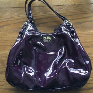 Authentic used coach eggplant patent purse.