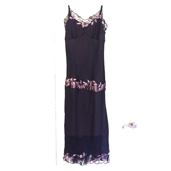 Purple cocktail dress with floral embellishments