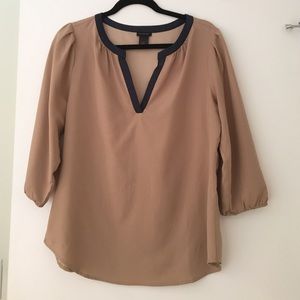 Tan and navy blouse