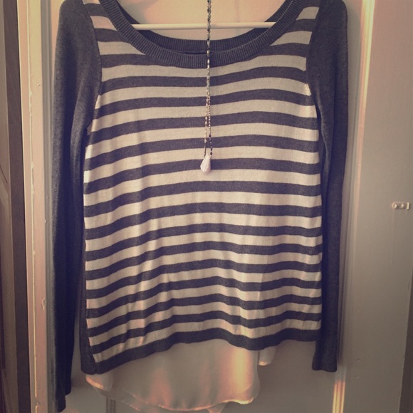 Express sweater with blouse underlay.