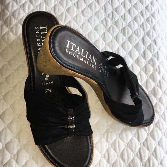 Black slip in cork wedge. Runs small. Super comfy!