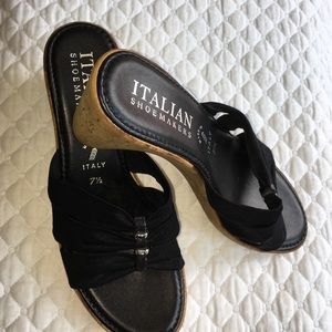 Black slip in cork wedge. Runs small. Super comfy!