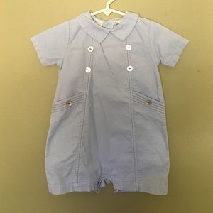 Light blue corduroy shortalls.