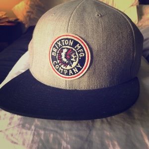 Brixton branded SnapBack style hat.