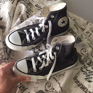 Black Chuck Taylor high tops