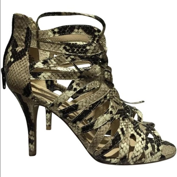 Peep toe lace up booties.