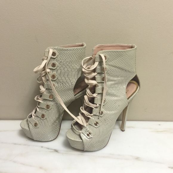 Faux snakeskin lace up bootie