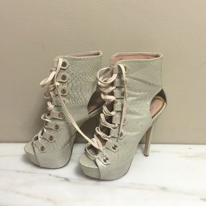 Faux snakeskin lace up bootie