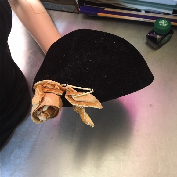 Cute black velvet fascinator hat with gold flower