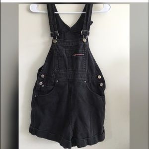 Distressed black denim overalls