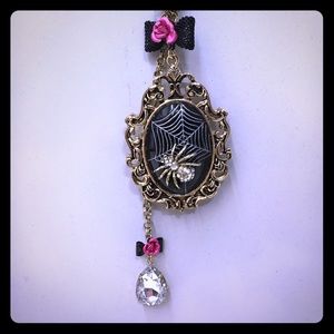Betsey Johnson bow and spider locket