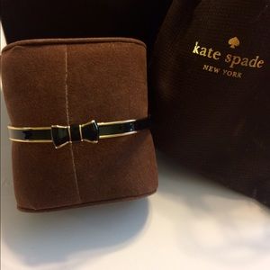 Kate Spade shiny gold & black bow bangle bracelet