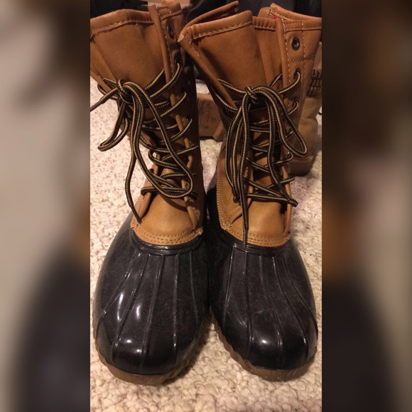 Black and brown duck boots