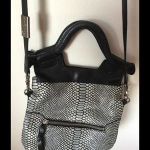 Foley & Corinna mini crossbody strap bag.