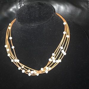 Multiple 18"leather strand necklace with pearls