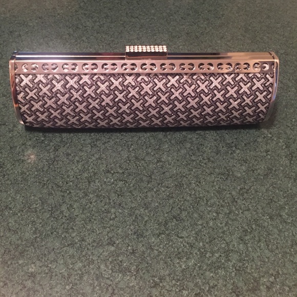 Silver, gray, and black clutch