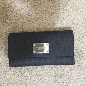 Michael Kora clutch wallet.