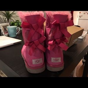 UGG boots with bow ties on the back