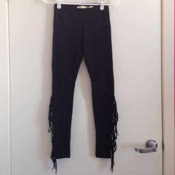 Black leggings with fringe down side of legs