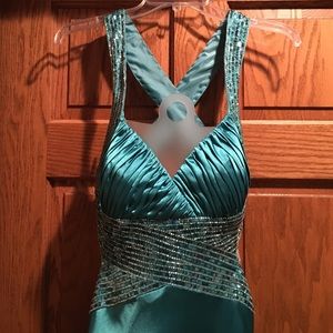 Teal x back, floor length homecoming dress.