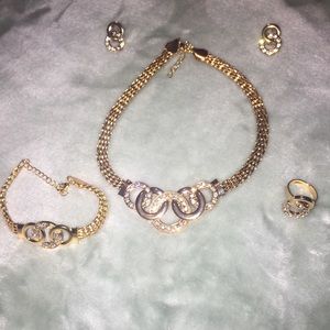 Complete gold crystal handcuff set