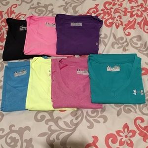 Lot of 7 Under Armour shirts.