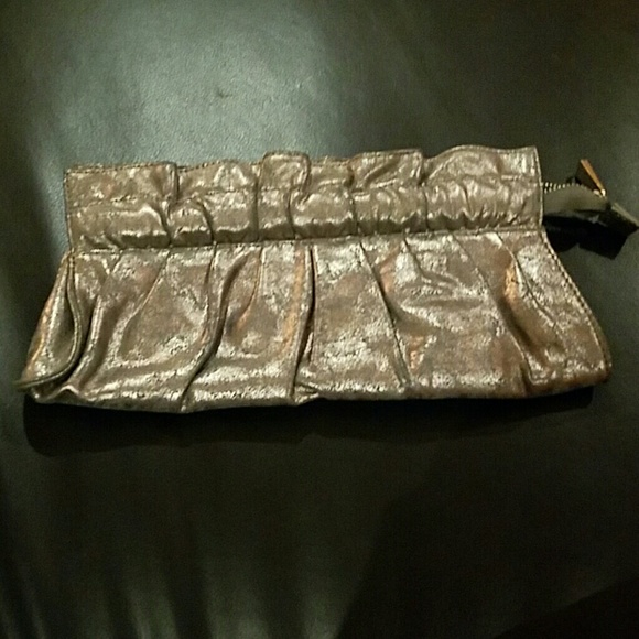 Metallic silver clutch