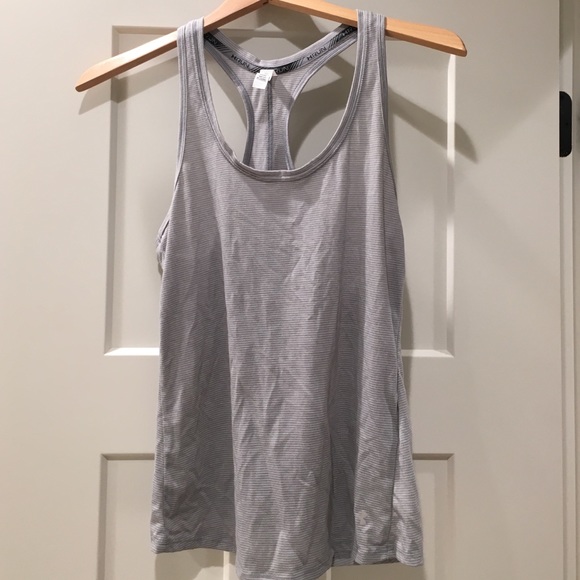 Grey Under Armour running tank