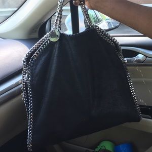 hand bag which can be converted in to a clutch