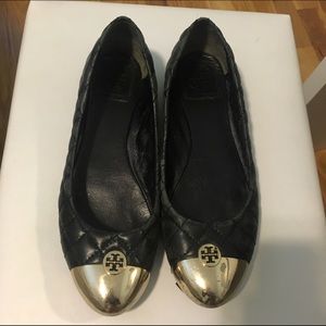 Black and gold Tory Burch flats