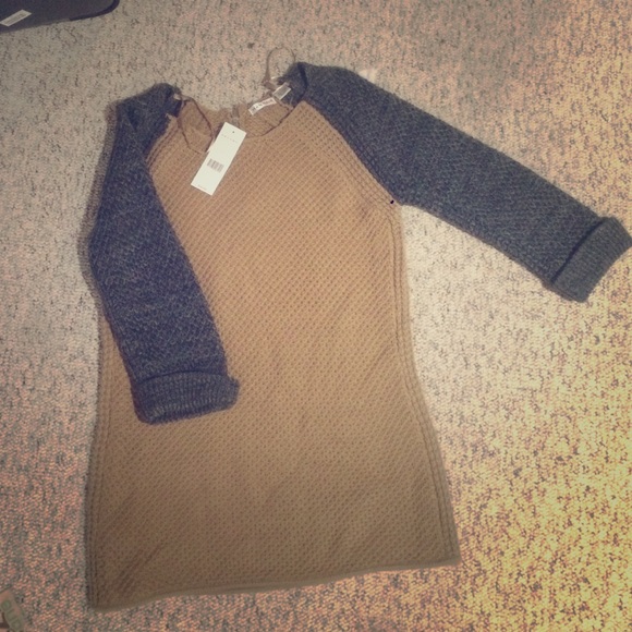 A brown/ grey longer sweater