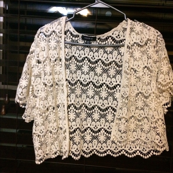 Selling a beige lace shrug