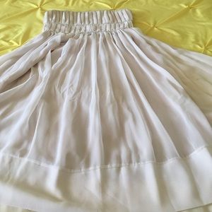 Sheer tube top flowing dress.