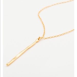 Tanner dagger long necklace in gold. New