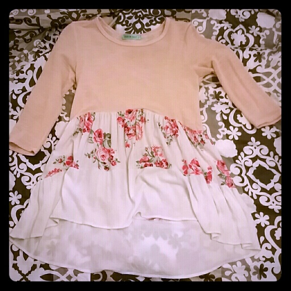 Peasant top with floral detail.