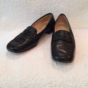 Ferragamo's loafers. Interlock.