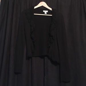 Black cardigan with lace lapel.