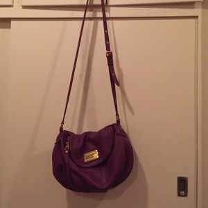 Purple crossbody bag.