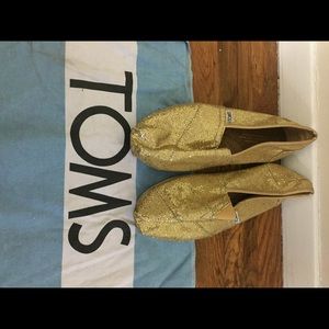 Toms gold sequined shoes in Size 7.