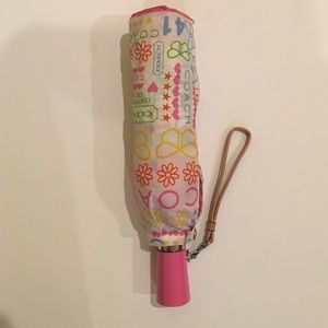Coach umbrella in pink bandana print