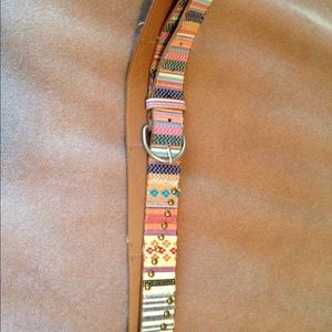 Multi colored patterned and studded belt