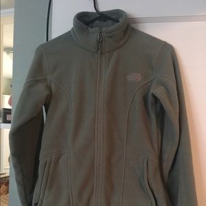 Small Women's muted green North Face zip up jacket