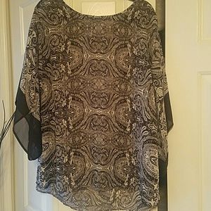 Sheer blouse/poncho style.