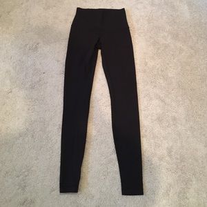 Women's all black Lululemon leggings
