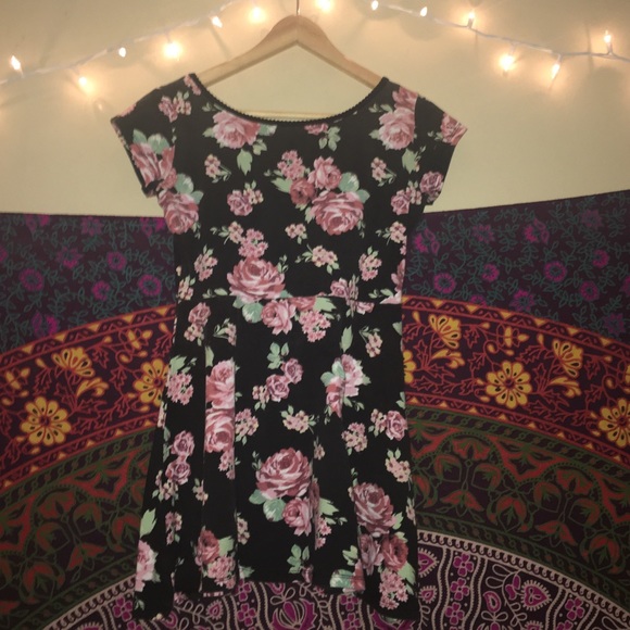 Floral dress, brandy look alike, tight fit.