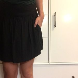Black mini skirt with pockets